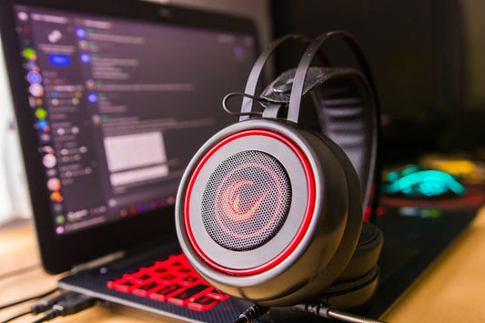 a close up of a pair of headphones on a laptop