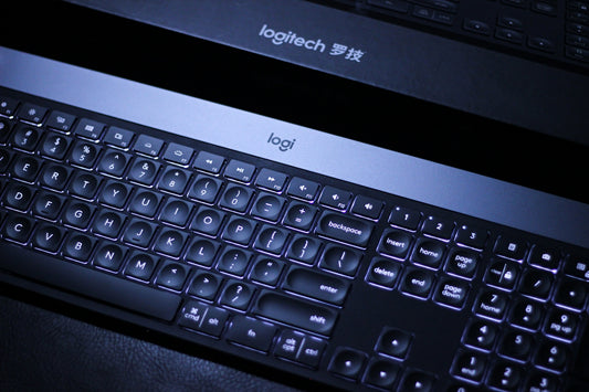 a black keyboard with a white background