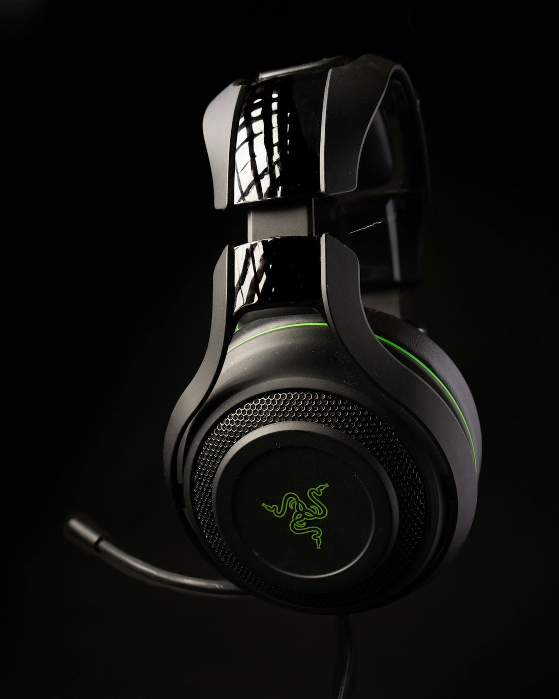 a close up of a gaming headset on a black background
