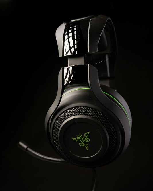 a close up of a gaming headset on a black background