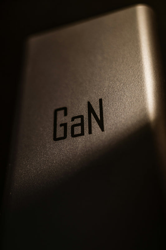 A close up of a computer keyboard with the word gan on it